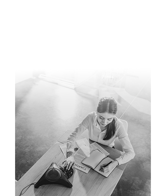 A woman on the phone making a business call