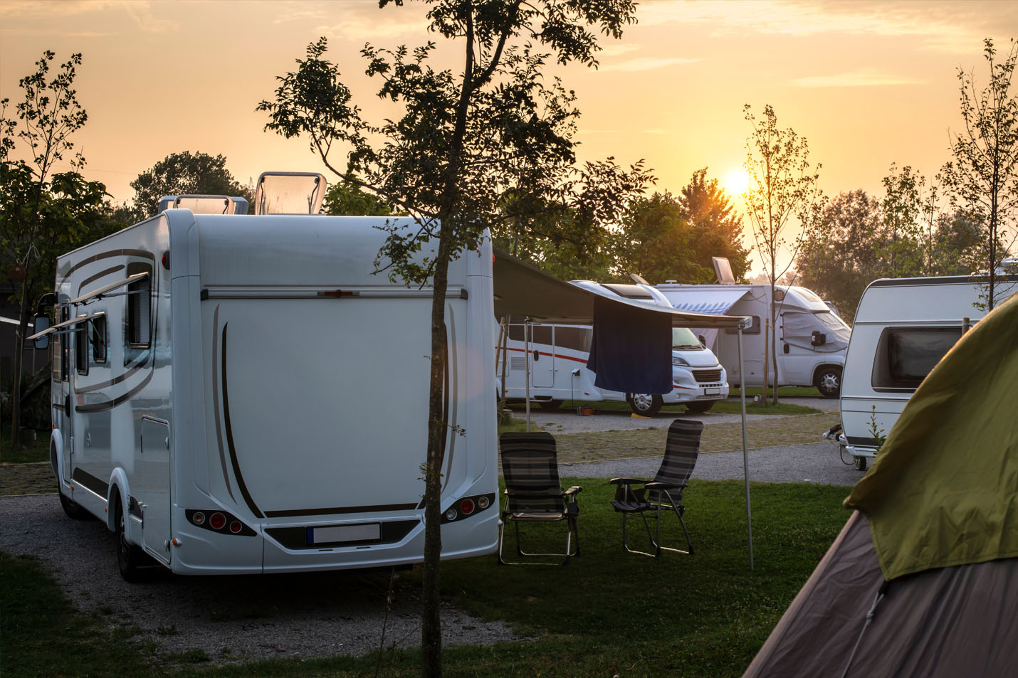 An RV parked at a camp ground