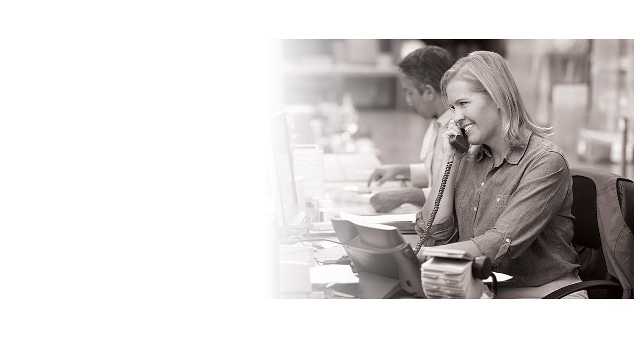 A woman on the phone making a business call